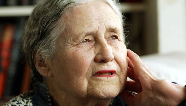 FILE - In this April 17, 2006 file photo, Writer Doris Lessing, 86, sits in her home in north London. Doris Lessing, the free-thinking, world-traveling, often-polarizing writer of "The Golden Notebook" and dozens of other novels that reflected her own improbable journey across the former British empire, has died, early Sunday, Nov. 17, 2013. She was 94. The author of more than 50 works of fiction, nonfiction and poetry, Lessing explored topics ranging from colonial Africa to dystopian Britain, from the mystery of being female to the unknown worlds of science fiction. (AP Photo/Martin Cleaver, File)