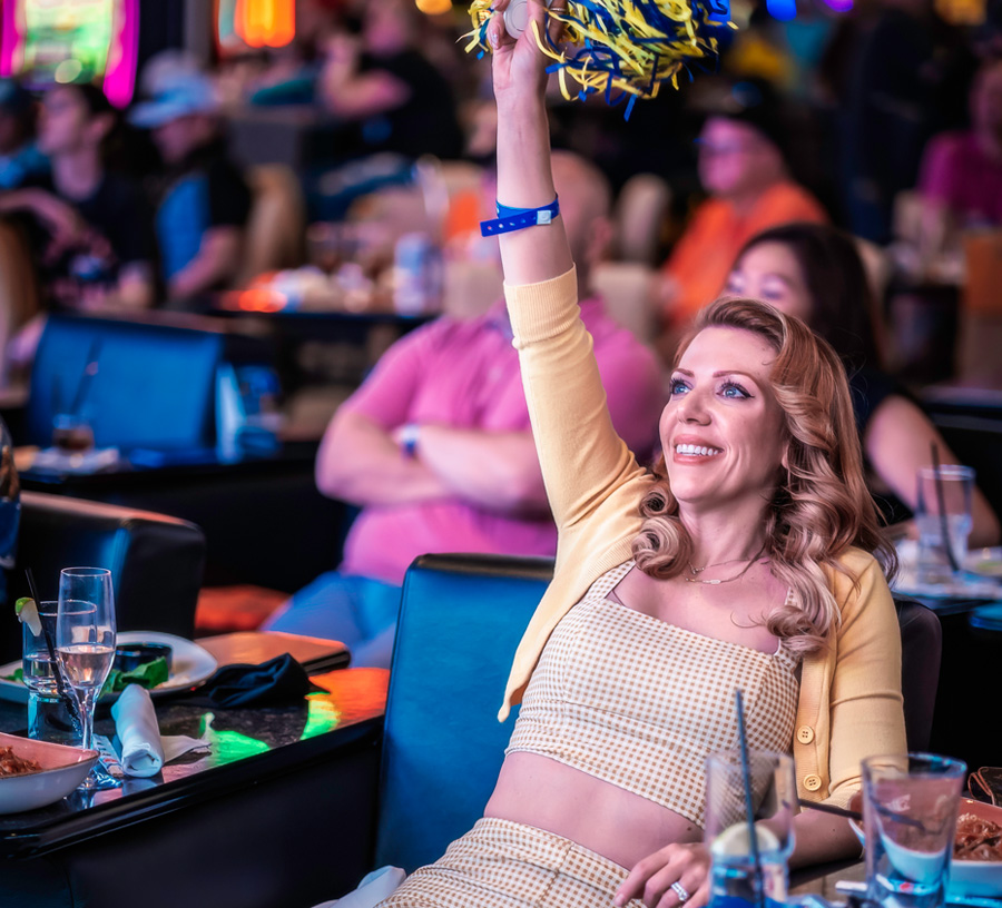 woman watching sports at 360 Sports Bar