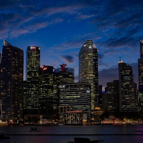 tall city buildings at night