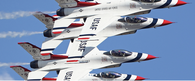 Four USAF jet planes in the clear blue sky