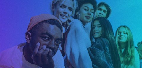 A group of young people looks at the camera with a blue filter applied to the photo.