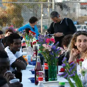 Let all who are hungry come and eat: Seder hosted by Israelis for African Refugees in Tel Aviv, 2008 (photo: Flash90)