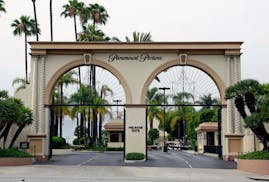 FILE - The main gate to Paramount Studios is seen on Melrose Avenue, July 8, 2015, in Los Angeles. Entertainment giant Paramount has agreed to merge w