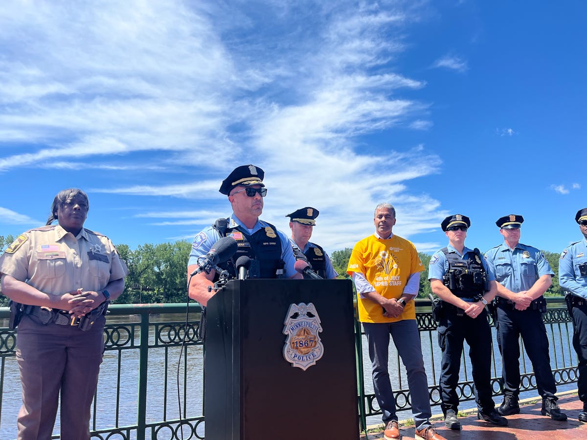 Minneapolis Police Chief Brian O'Hara, at lectern, along with Hennepin County Sheriff Dawanna Witt, Park Police Chief Jason Ohotto, Minneapolis Parks 