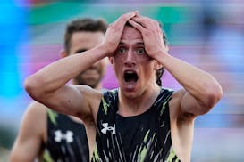 Matthew Wilkinson celebrates his second-place finish in the men's 3,000-meter steeplechase final during the U.S. Olympics track and field trials Sunda