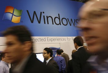 FILE - In this Jan. 11, 2010 file photo, a display for Microsoft's Windows 7 is shown at the National Retail Federation's convention in New York. User