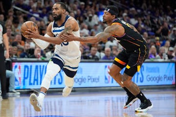 Wolves guard Mike Conley drives past Suns guard Bradley Beal in the first half Friday night, one of dozens of possessions that helped decide the outco