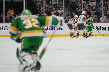 Wild goaltender Filip Gustavsson (32) skates to the bench after coach John Hynes pulled him during overtime.