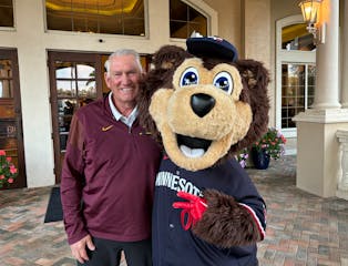 A couple of Minnesota icons, Gophers baseball coach John Anderson and Twins mascot TC Bear, hung out Friday morning in Naples, Fla.