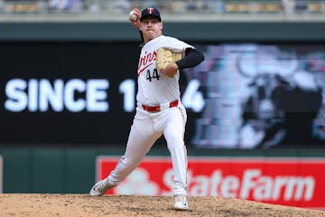 Twins relief pitcher Cole Sands delivers against Red Sox during the ninth inning Saturday at Target Field as the Twins stretched their winning streak 