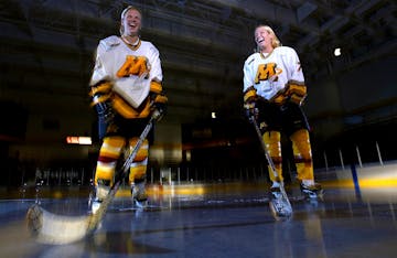 Natalie Darwitz, left, and Krissy Wendell-Pohl pose for a photo as Gophers freshmen in 2002, the year Ridder Arena opened.