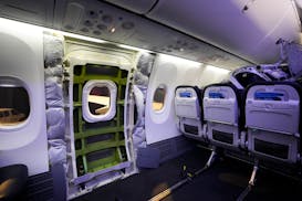 File - A door plug area of an Alaska Airlines Boeing 737 Max 9 aircraft awaiting inspection is pictured with paneling removed at the airline's facilit