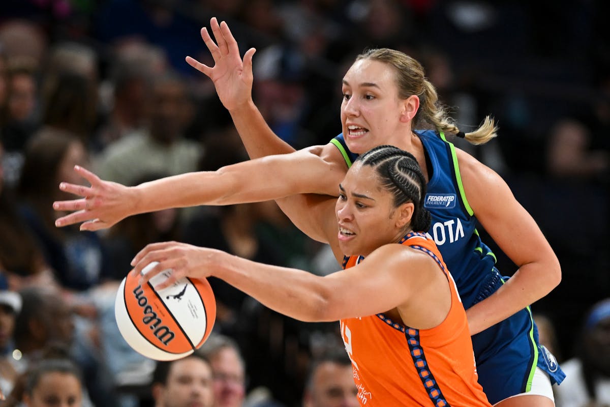 Lynx forward Alanna Smith defends against Connecticut forward Brionna Jones in the first quarter Thursday at Target Center.