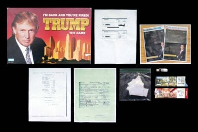 Trump board game, Mar-a-Lago receipt, recreation of papers hand shredded by Trump in a plastic bag.