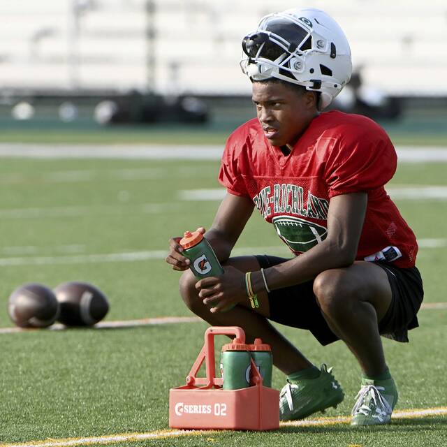 Pine-Richland quarterback Aaron Strader watches a preseason practice.