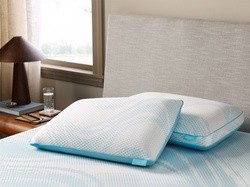 Breeze ProHi and Breeze ProLo pillows stacked on a Breeze mattress