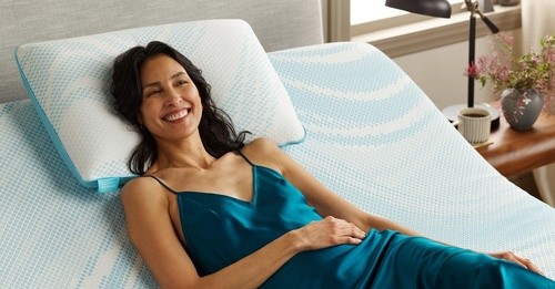 Woman laying on breeze pillow and breeze mattress