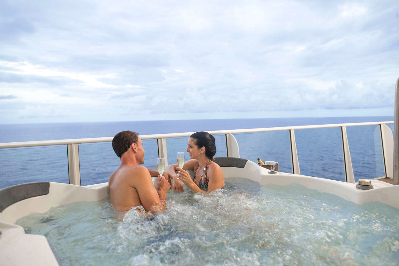 Couple Enjoying the Balcony Jacuzzi 