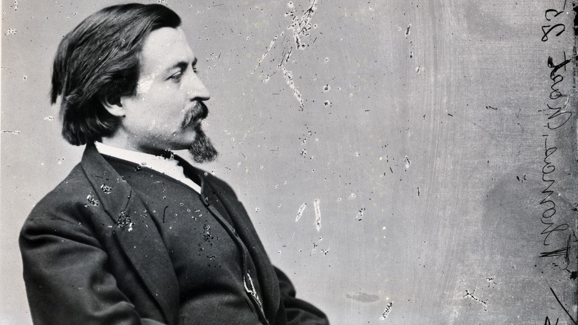 Seated portrait of cartoonist Thomas Nast. Photo by Matthew Brady.