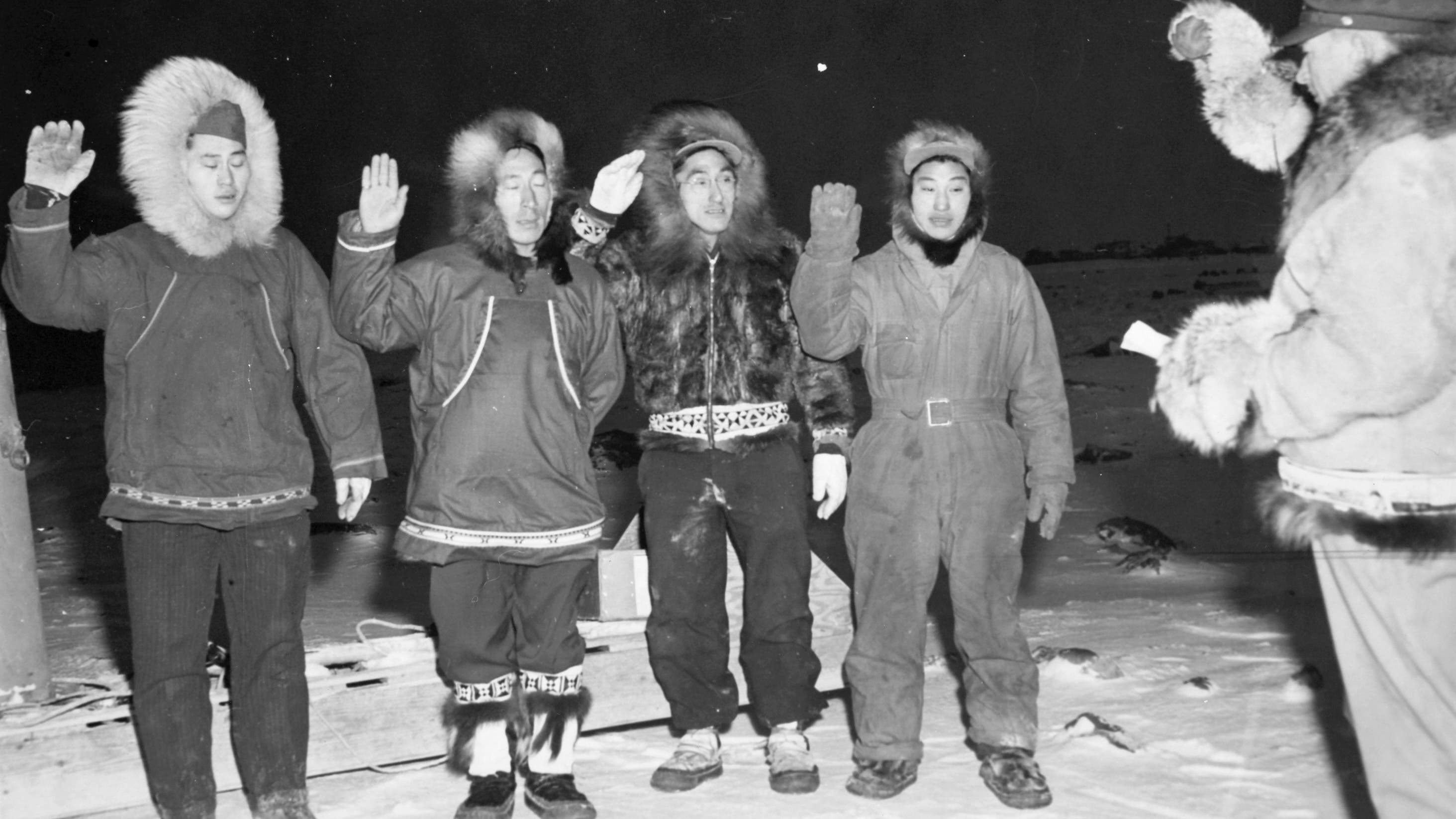 Four Alaska Territorial Guardsmen being sworn in for an assignment in Barrow, Alaska.