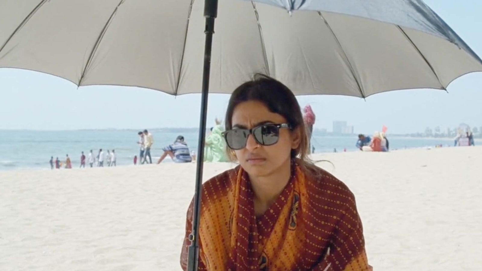 Image may contain Radhika Apte Photography Accessories Sunglasses Person Adult Face Head Portrait Beach and Coast