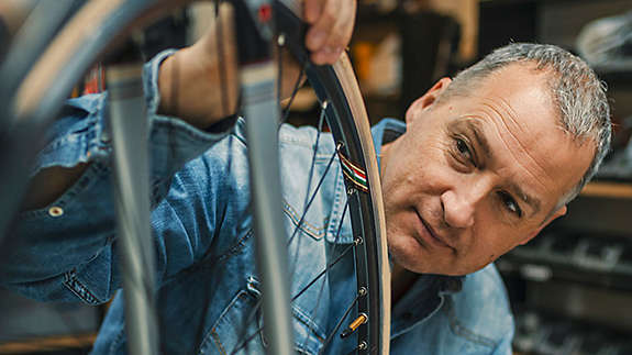 Man working in bicycle shop