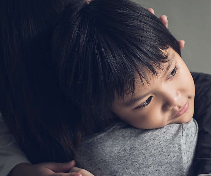 Mom comforting son