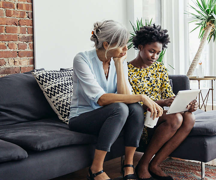 Two people reviewing notes.