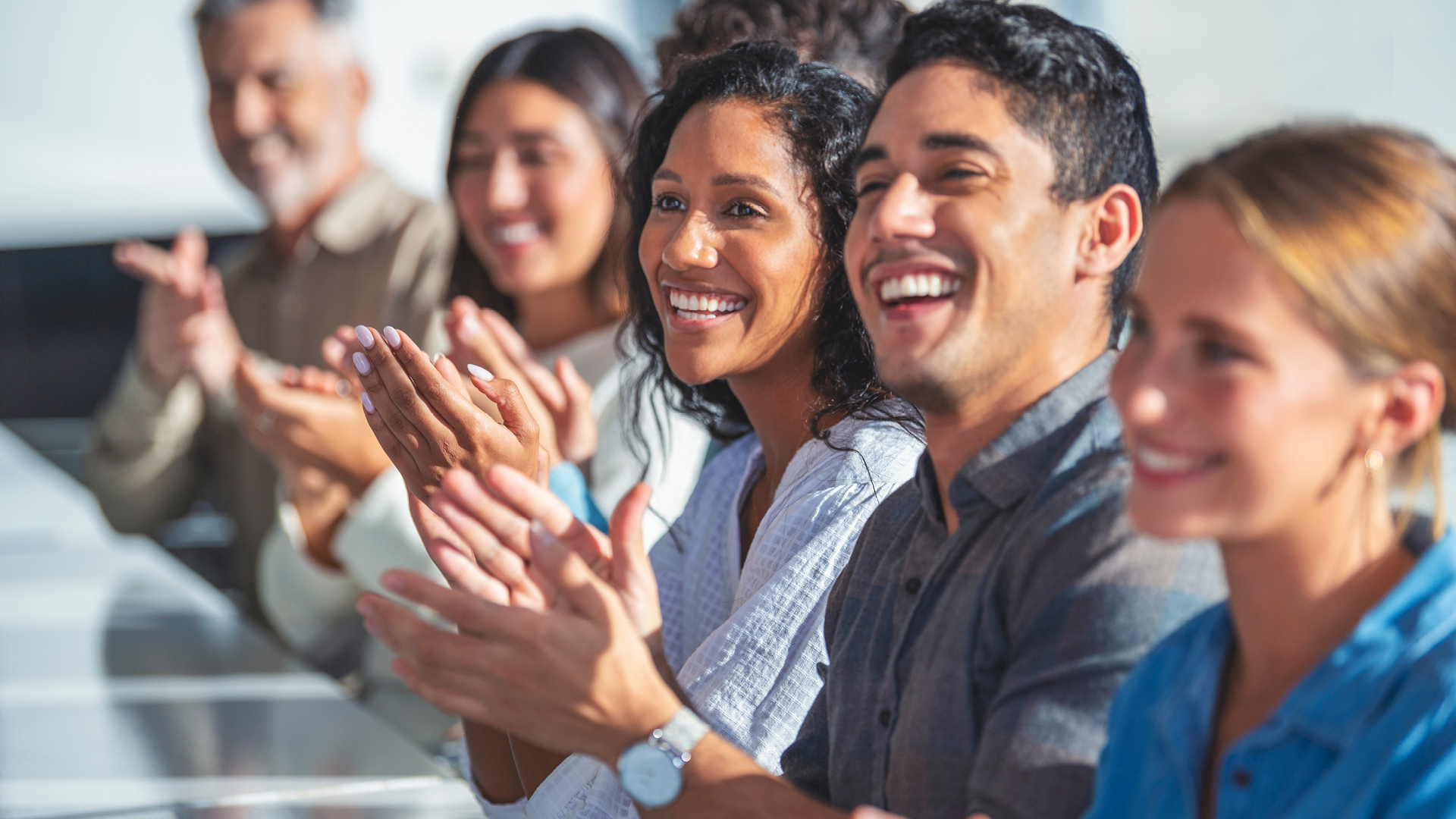 Group of people clapping