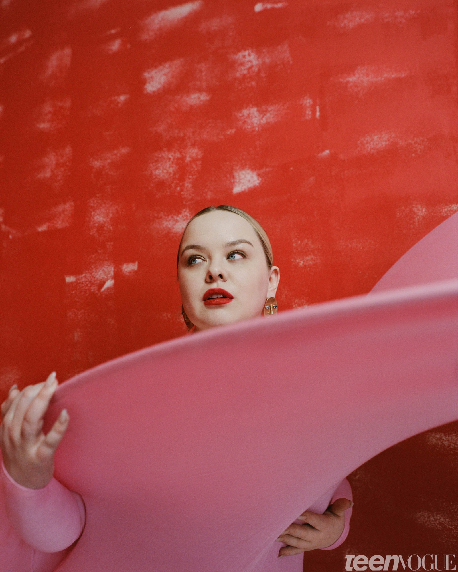 Nicola Coughlan in geometric pink dress with wide brim