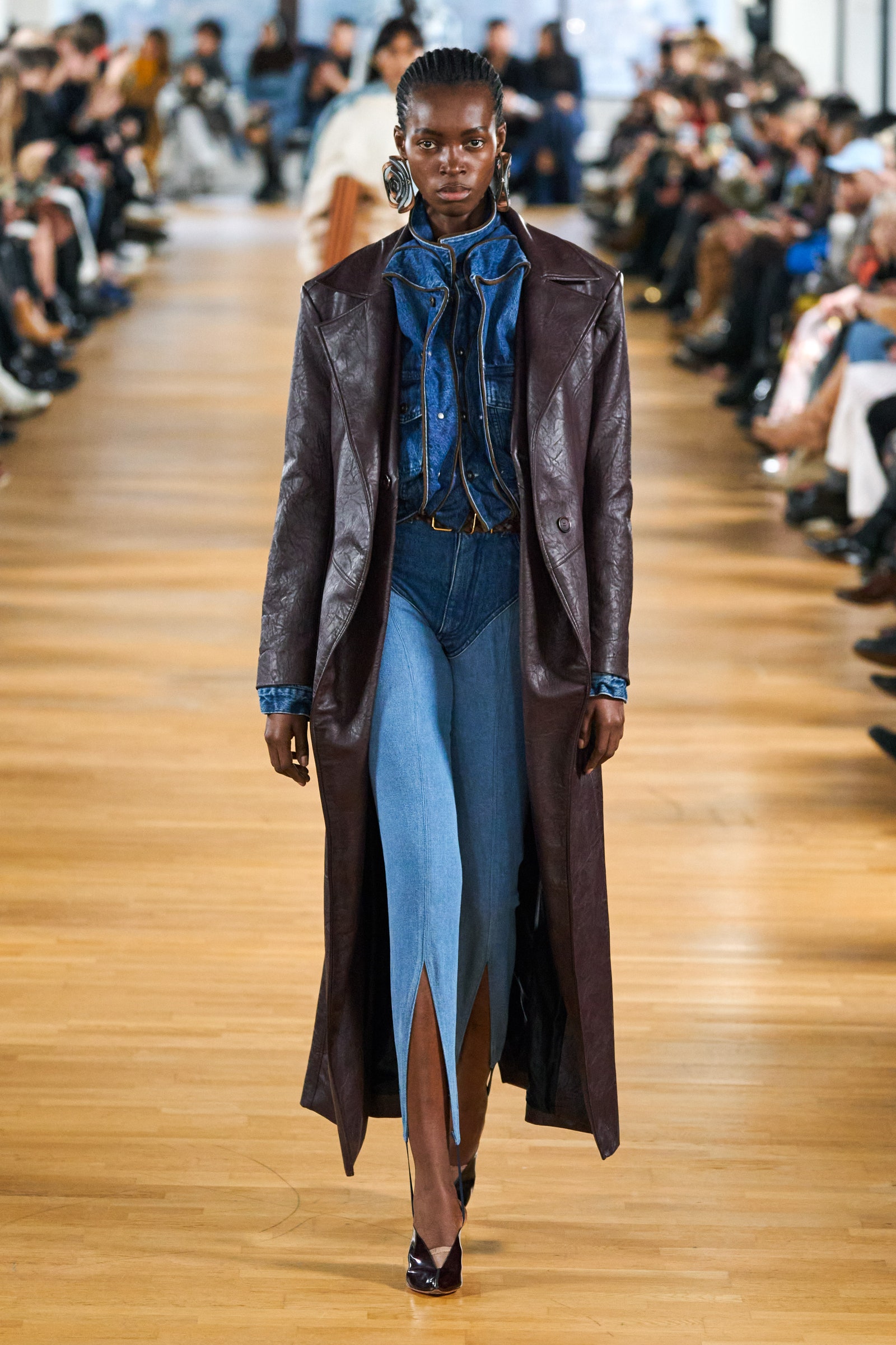 Image may contain Human Person Clothing Apparel Runway Fashion and Wood