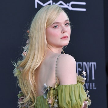 Elle Fanning Gets Extra Creative With a Red Lip While at Home