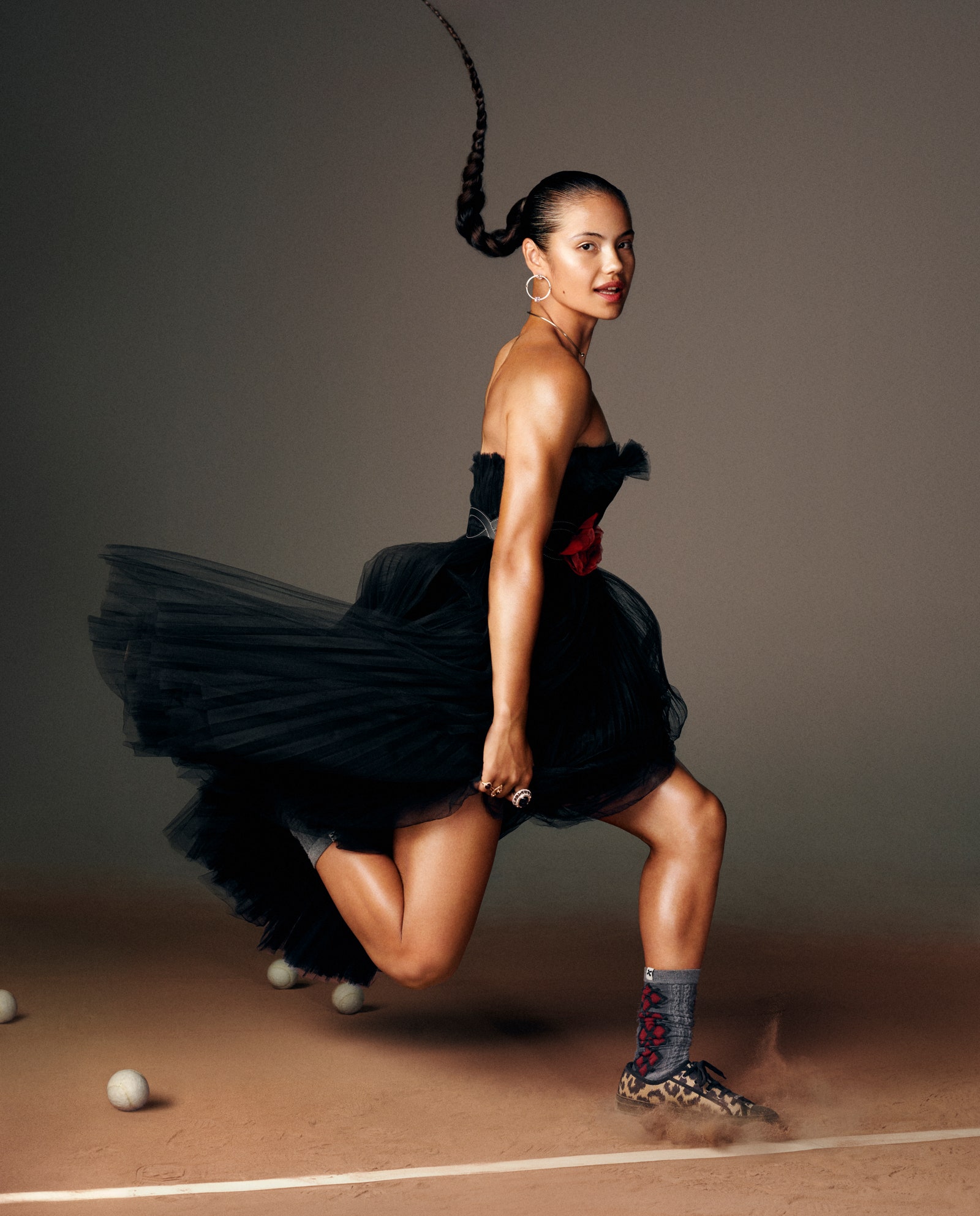 “Playing sports and having to be fearless its given me inner strength” Ranucanu says. Dior dress. Molly Goddard shoes....