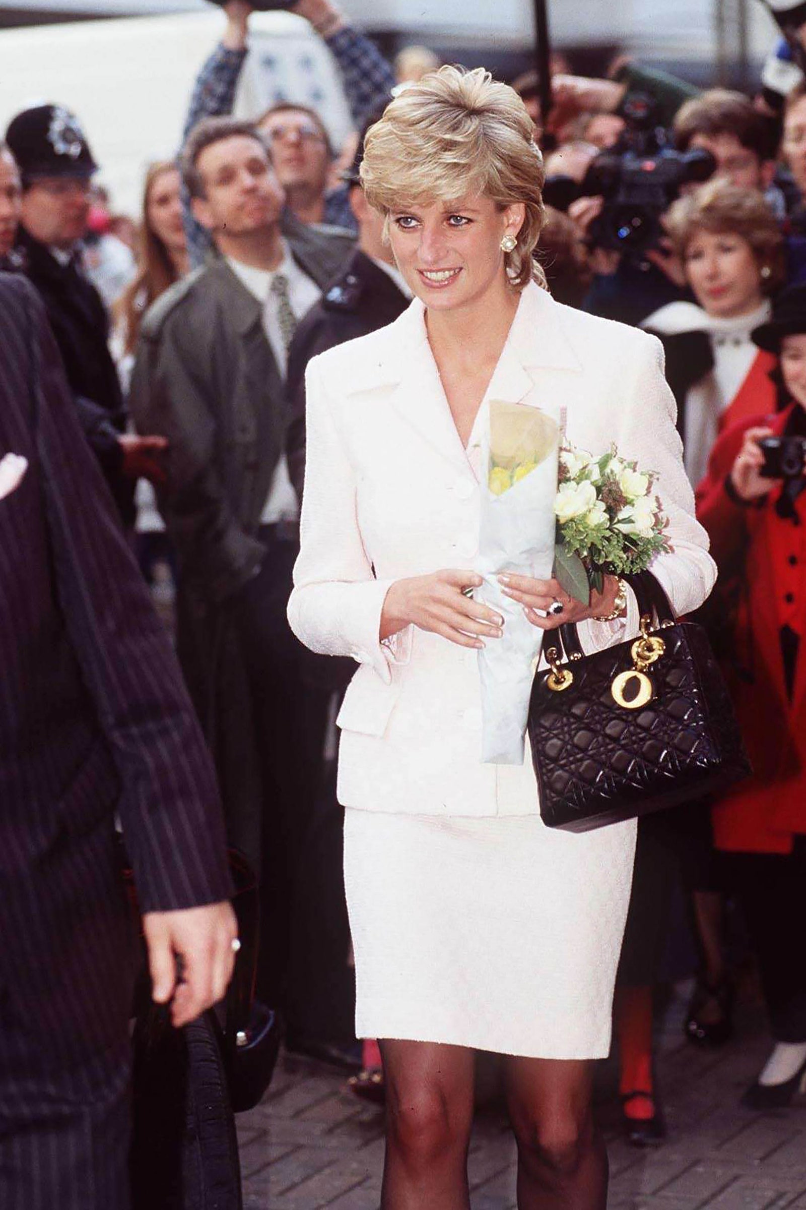 Image may contain Diana Princess of Wales Human Person Clothing Apparel Bag Handbag Accessories and Accessory