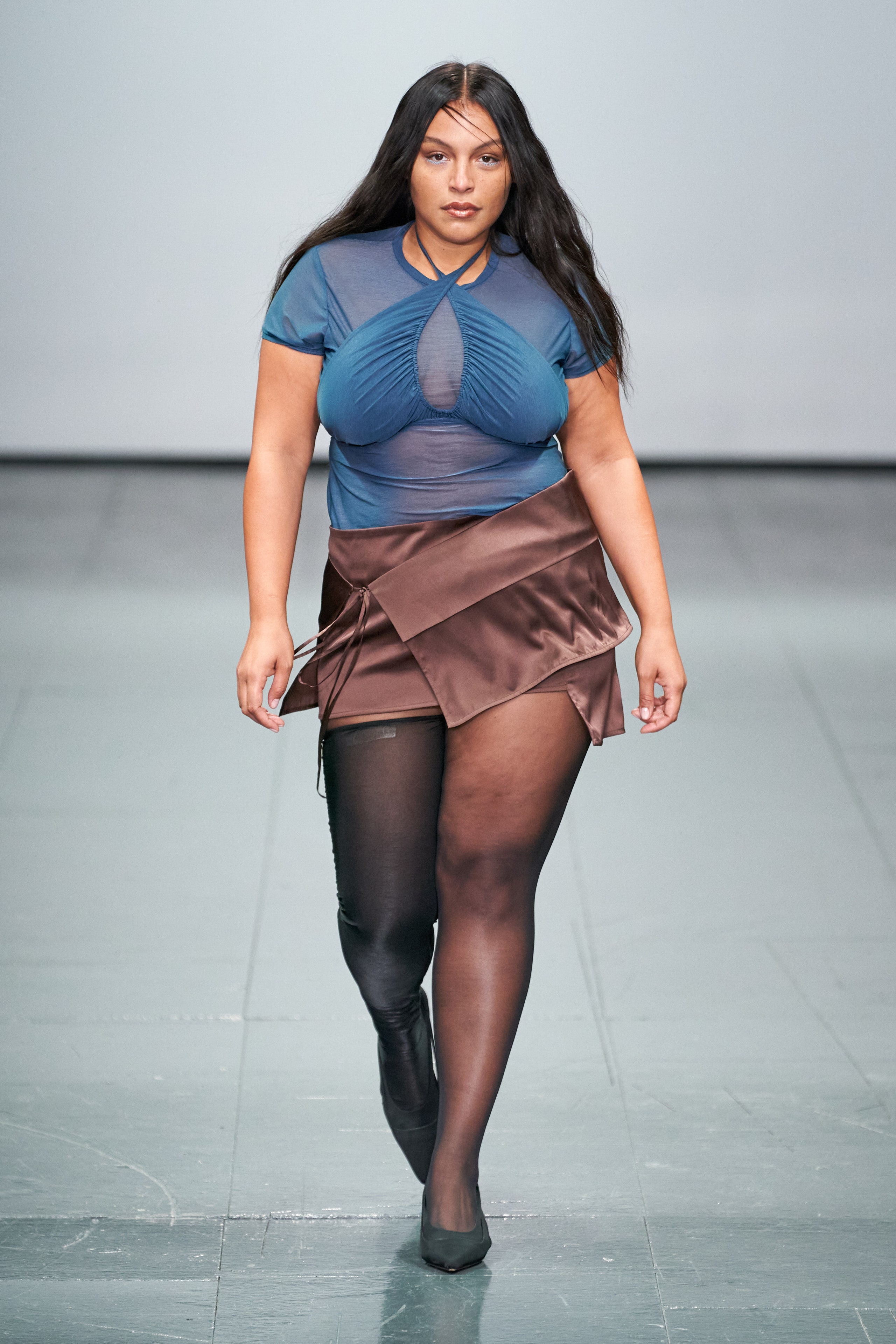 Image may contain Human Person Clothing Apparel and Runway