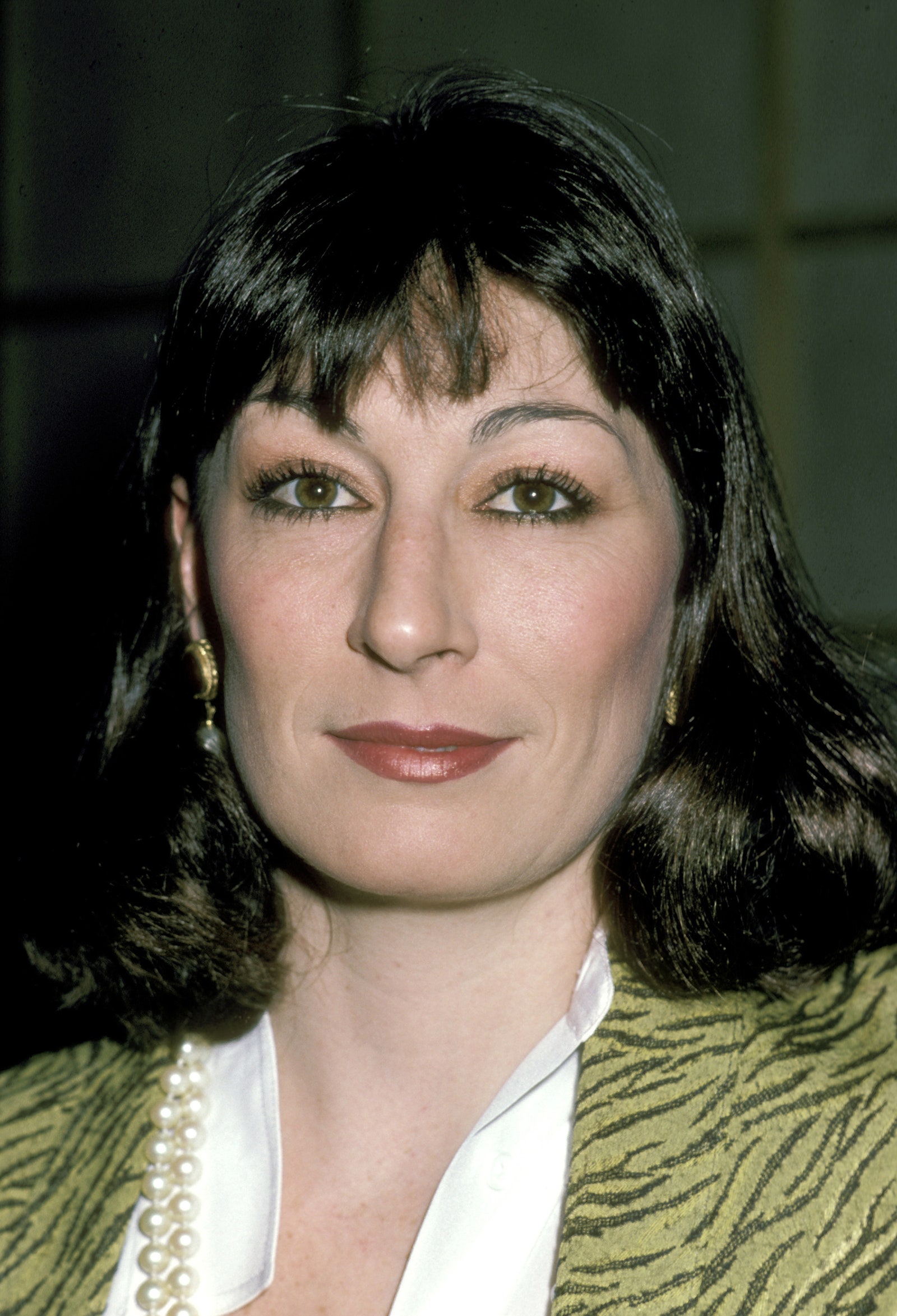 A Look Back at Anjelica Hustons Best Vintage Beauty Moments