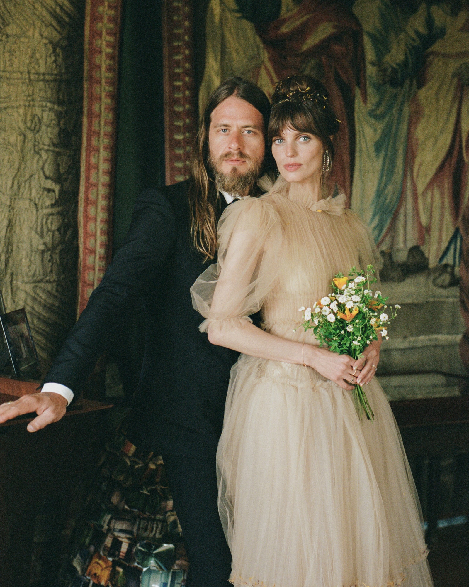 Lola McDonnell went with a top knot for her wedding at Isabella Blows former Cotswold estate.