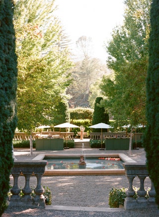 Image may contain Garden Outdoors Arbour Flagstone Furniture Water Plant Tree and Slate