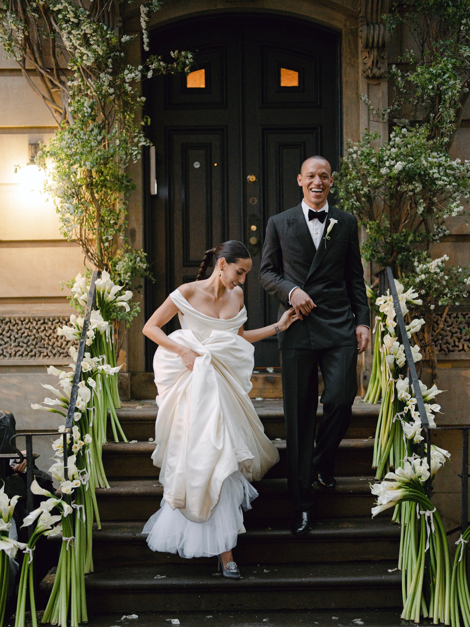 For her evening reception at Balthazar in New York City Lauren Rodriguez opted for a braided ponytail.