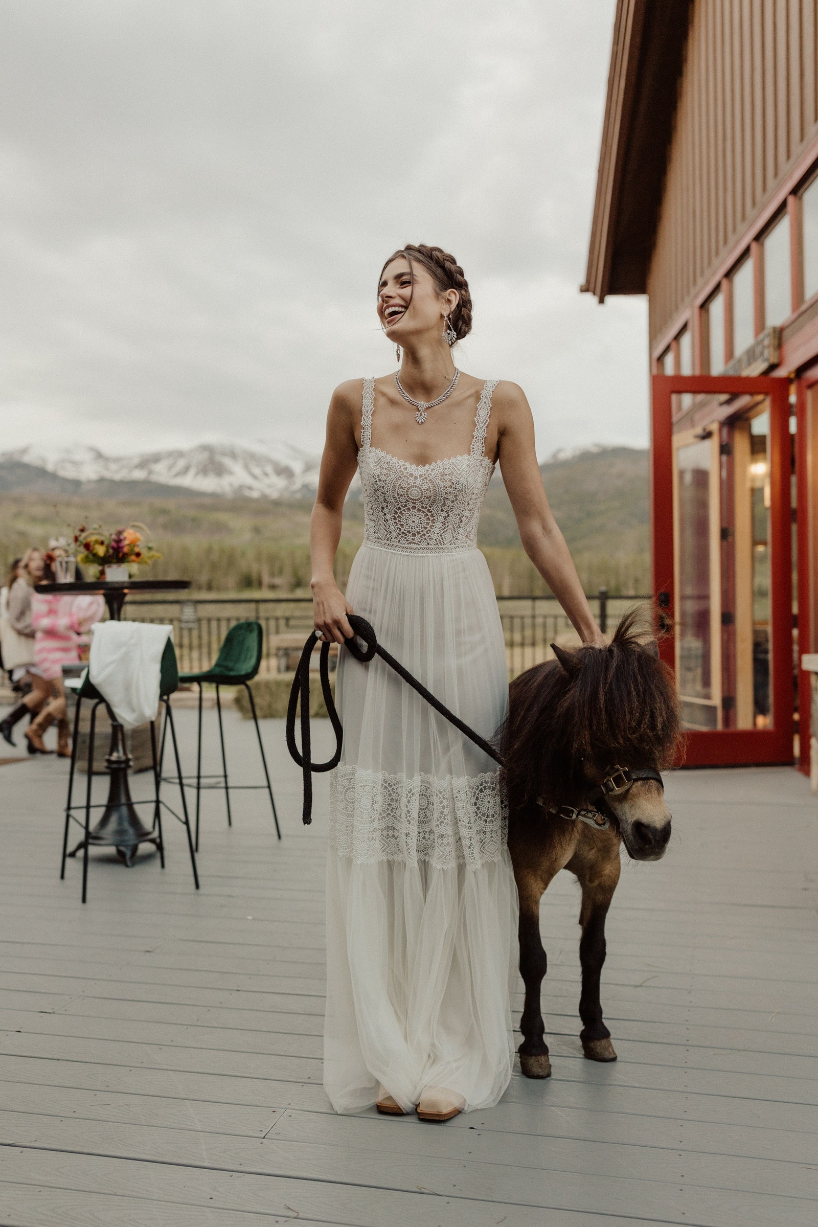 Taylor Hills braid crown was an appropriate aesthetic choice for her Colorado welcome party.