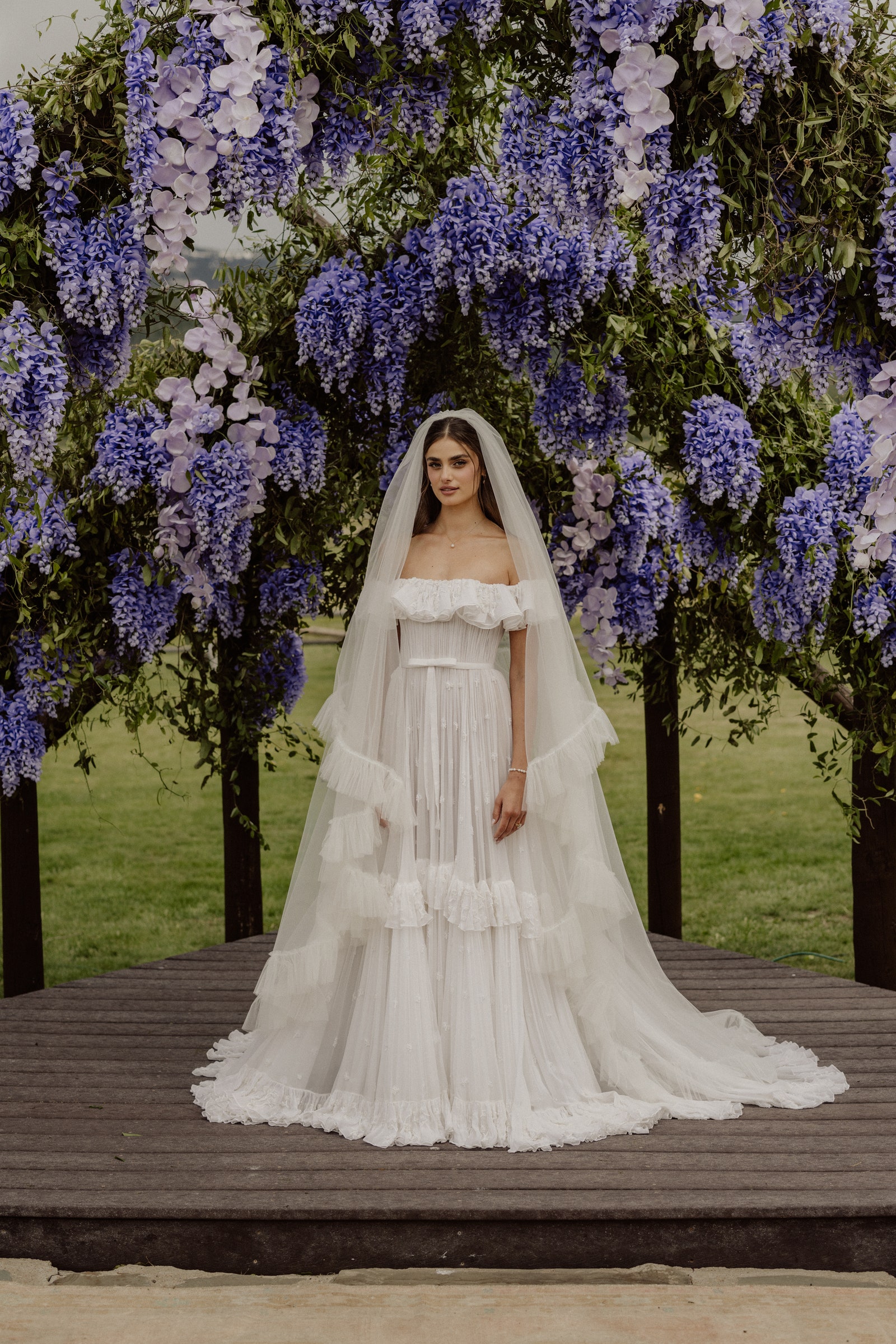 Taylor Hill kept her hair tamed but wild during her ceremony.