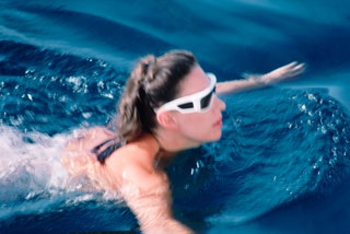 Margaret swimming in the sea in Costa Smeralda Sardinia photographed by Slim Aarons.