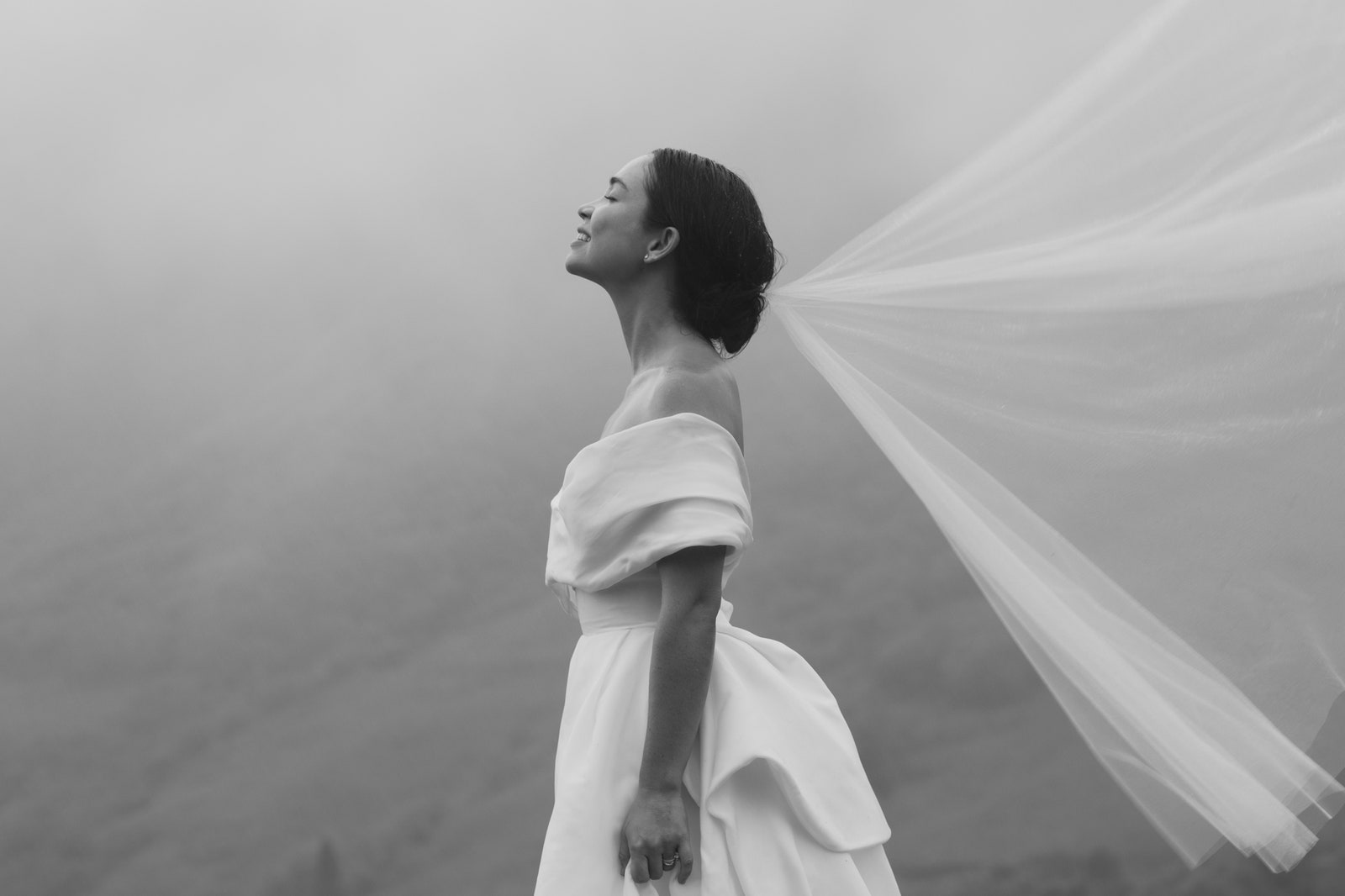 Oleema Millers bun held up amid the rain for her Hawaiian wedding.