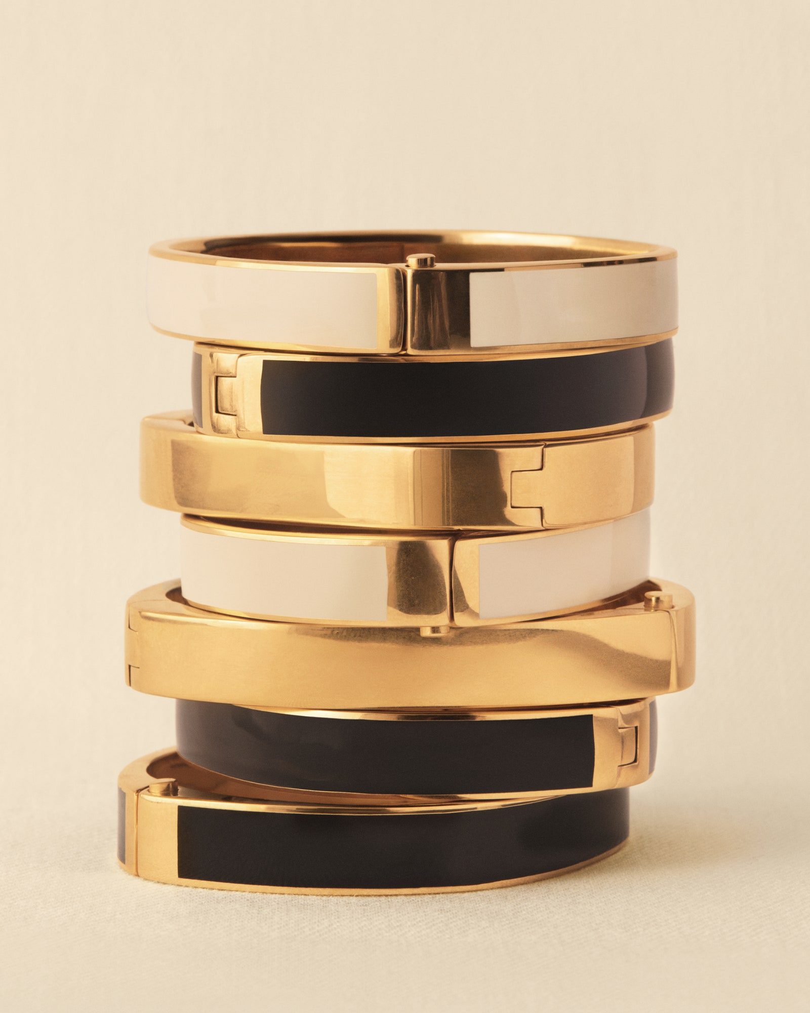 Enamel bangles are part of the fashion jewelry offering.