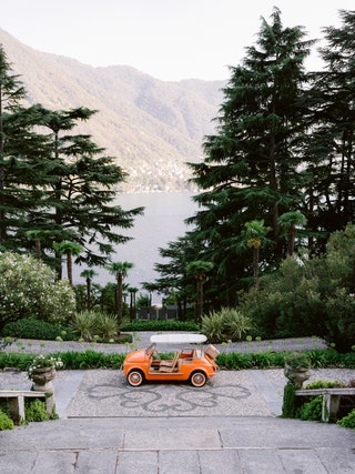 The iconic bright orange vintage opentop Fiat 500 used to transport us around the property.