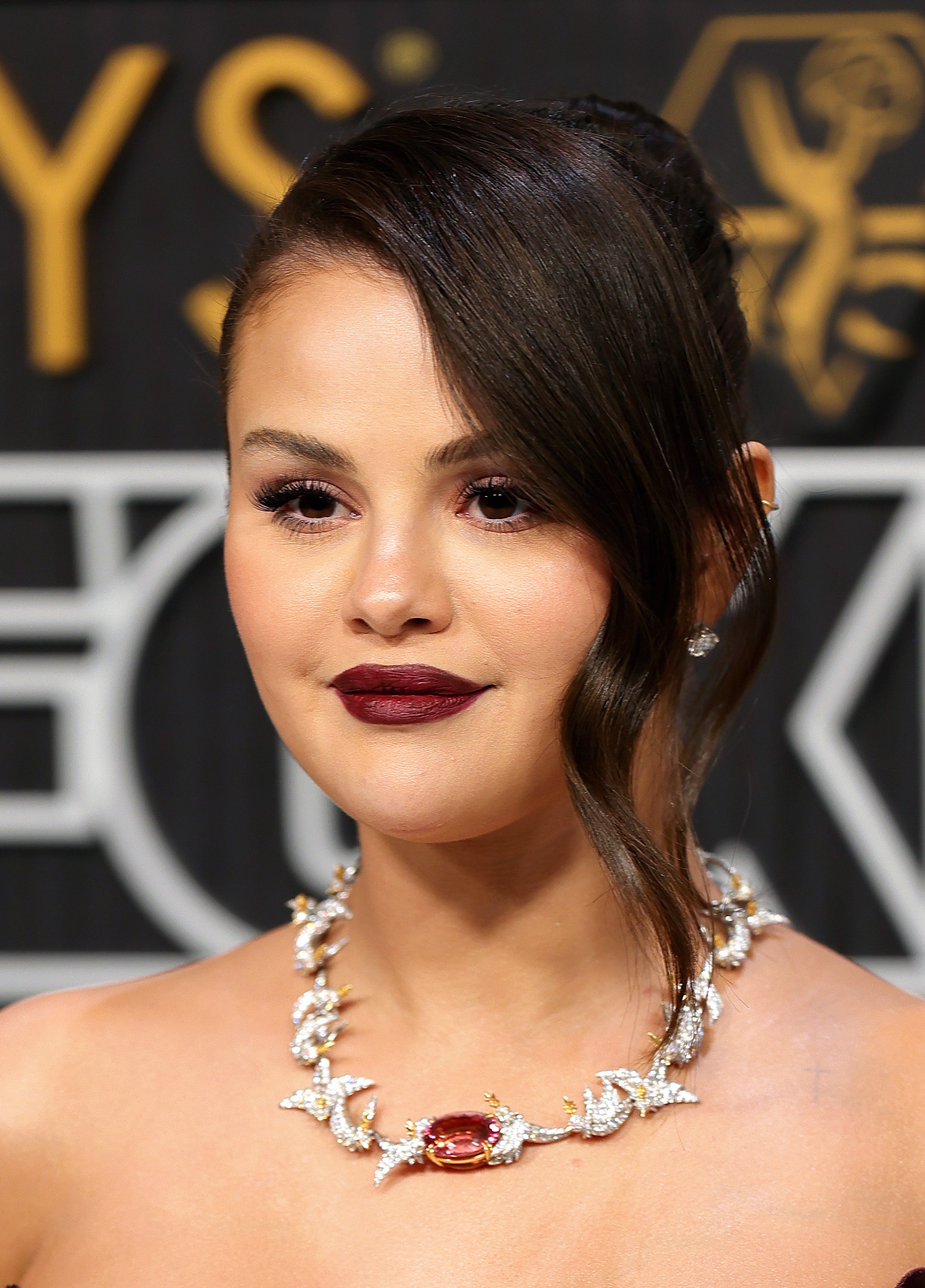 Selena Gomez Channels Her Namesake at the 2023 Emmys With an Updo and Red Lip