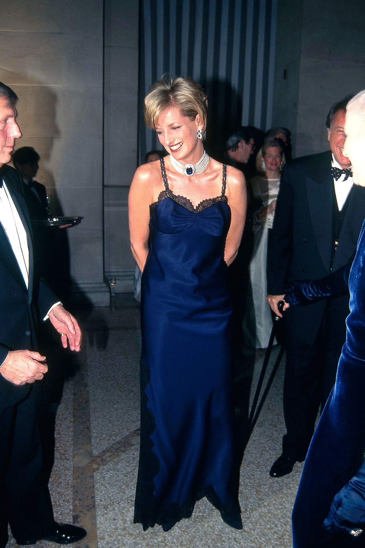 Image may contain Diana Princess of Wales Person Formal Wear Clothing Dress Suit Accessories Tie Fashion and Adult