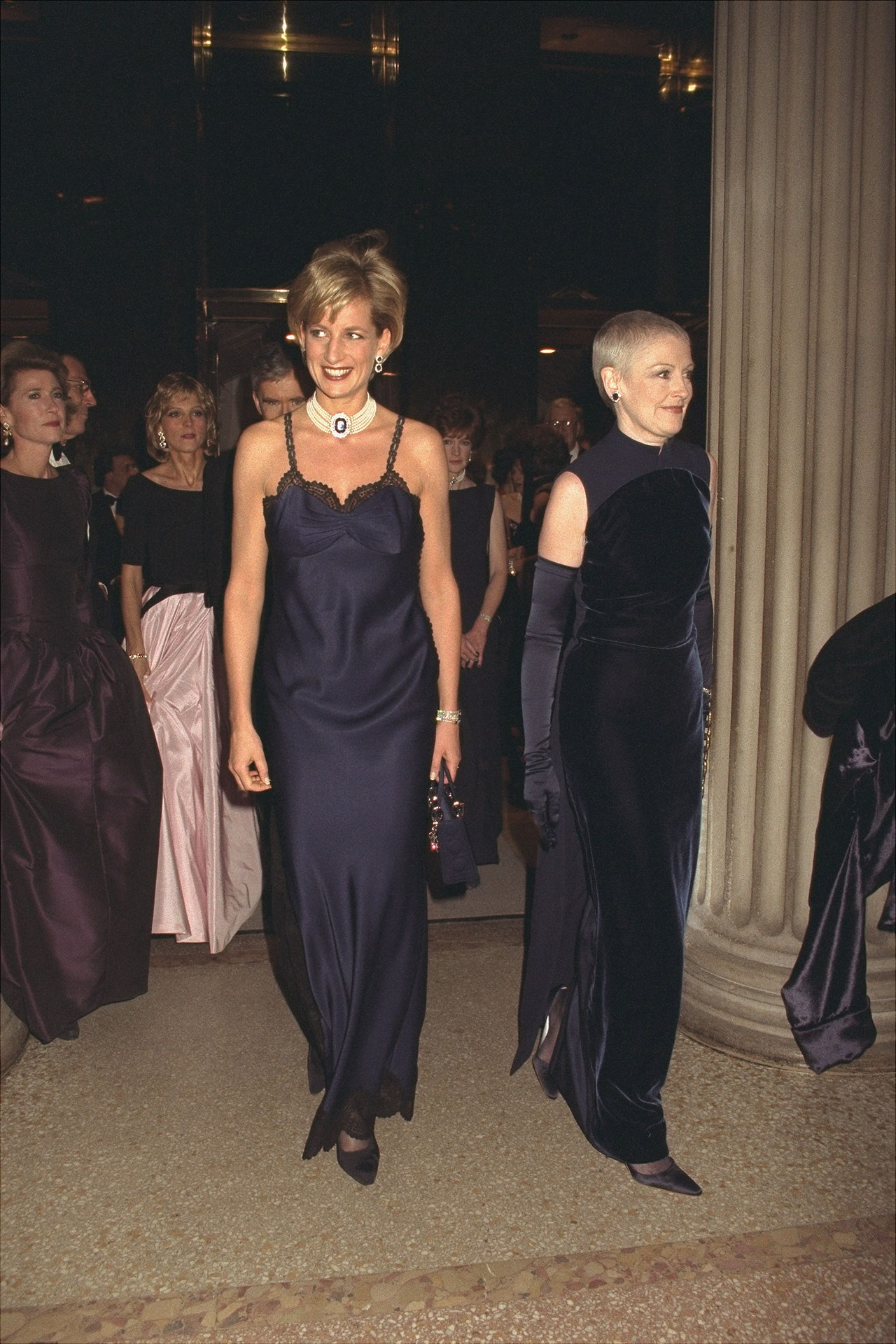 Image may contain Diana Princess of Wales Clothing Dress Formal Wear Person Evening Dress Footwear and High Heel