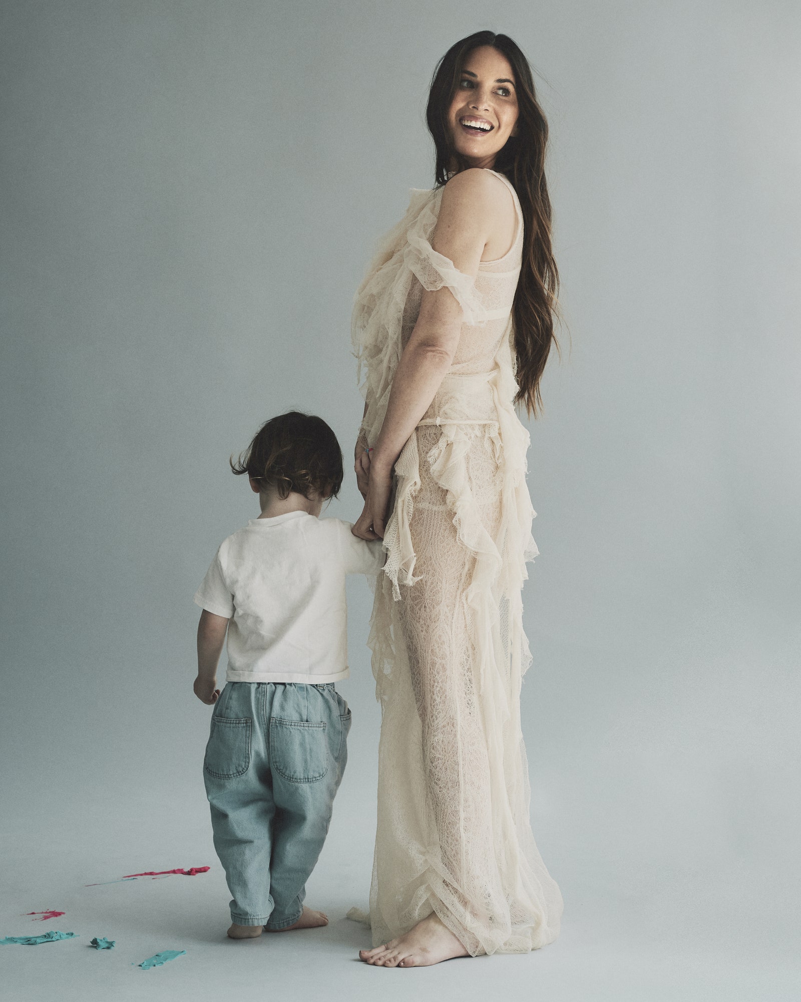 Olivia Munn in a lace dress with her son Malcolm in NYC