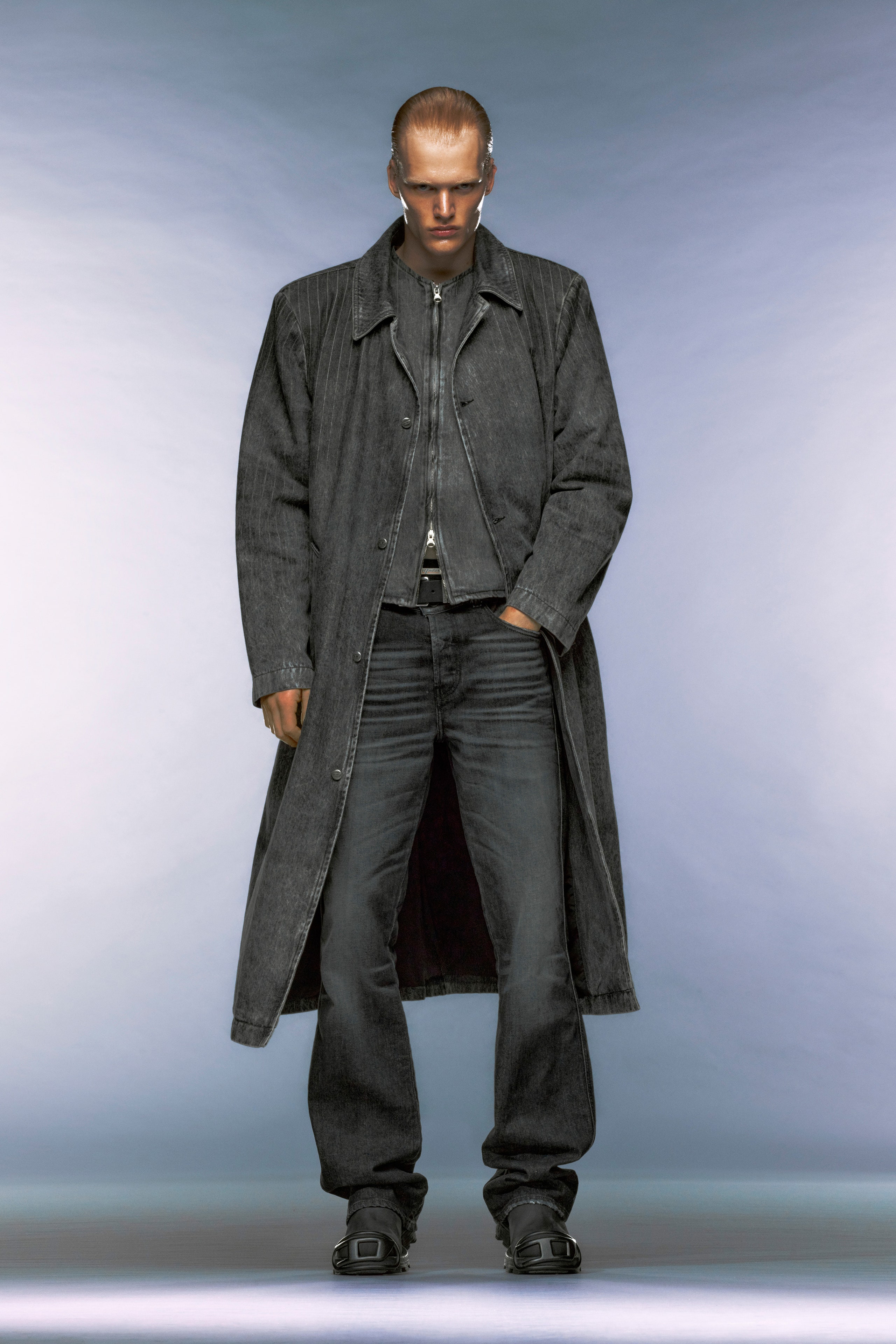 Image may contain Clothing Coat Overcoat Jacket Adult Person and Pants